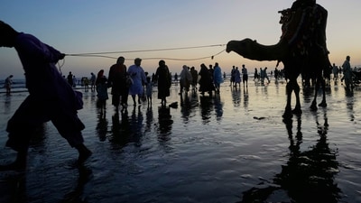 In Karachi, Pakistani officials have ordered a beach ban due to strong waves caused by monsoon weather (AP) In Karachi, Pakistani officials have ordered a beach ban due to strong waves caused by monsoon weather (AP)