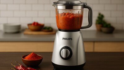 Philips mixer grinder in action grinding fresh ingredients for daily cooking. Philips mixer grinder in action grinding fresh ingredients for daily cooking.