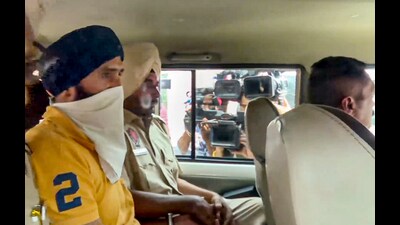 Punjab-based YouTuber Jasbir Singh being produced at a district court in Mohali on Saturday. (PTI) Punjab-based YouTuber Jasbir Singh being produced at a district court in Mohali on Saturday. (PTI)