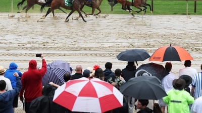 As the horses thundered down the track in a pre-Belmont race at Saratoga Race Course on June 7, 2025, spectators watched in eager anticipation.(Photo by AL BELLO / GETTY IMAGES NORTH AMERICA / Getty Images via AFP) (Getty Images via AFP) As the horses thundered down the track in a pre-Belmont race at Saratoga Race Course on June 7, 2025, spectators watched in eager anticipation.(Photo by AL BELLO / GETTY IMAGES NORTH AMERICA / Getty Images via AFP) (Getty Images via AFP)