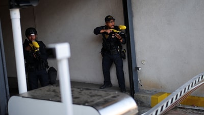 Police used pepper spray balls to disperse protesters blocking the garage entrance of the Los Angeles Federal Building after multiple detentions by ICE in downtown Los Angeles. (REUTERS)