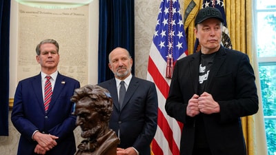 U.S. Treasury Secretary Scott Bessent and Elon Musk stand in the Oval Office during a press conference with U.S. President Donald Trump. (REUTERS)