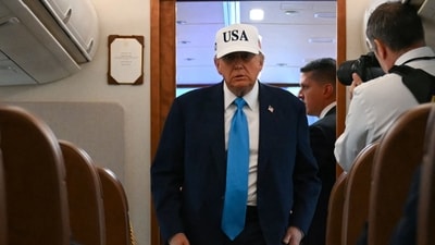 US President Donald Trump walks to talk to the press aboard Air Force One on the way to Morristown Municipal Airport in Morristown, New Jersey, on June 6, 2025. (AFP) US President Donald Trump walks to talk to the press aboard Air Force One on the way to Morristown Municipal Airport in Morristown, New Jersey, on June 6, 2025. (AFP)