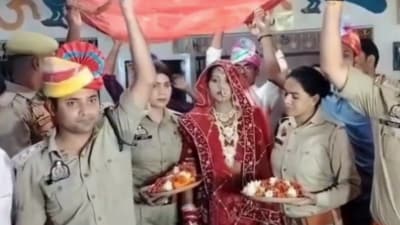 UP Police personnel in the Gonda district bore the entire cost of a wedding after the bride's brother was killed during a robbery. (PTI screengrab) UP Police personnel in the Gonda district bore the entire cost of a wedding after the bride's brother was killed during a robbery. (PTI screengrab)