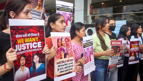 Relatives and friends of Sonam Raghuvanshi, who along with her husband Raja Raghuvanshi went missing during their honeymoon in Meghalaya, stage a protest against the Meghalaya government, in Indore, Saturday. (PTI)