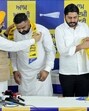 Councillor Satnam Singh Sunny Master being welcomed into the AAP by cabinet minister Tarunpreet Singh Sondh. (HT Photo)