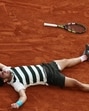 Spain's Carlos Alcaraz celebrates after defending the men's singles title by beating Italy's Jannik Sinner in the final at Roland Garros on Sunday. (REUTERS) Spain's Carlos Alcaraz celebrates after defending the men's singles title by beating Italy's Jannik Sinner in the final at Roland Garros on Sunday. (REUTERS)