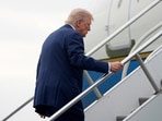 President Donald Trump boards Air Force One at Morristown Municipal Airport in Morristown, N.J., on his way to Camp David, Md., Sunday, June 8, 2025. 