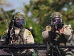 Members of law enforcement operate amidst a standoff between police and protesters following multiple detentions by Immigration and Customs Enforcement (ICE), in the Los Angeles County city of Paramount, California, U.S., June 7, 2025.  