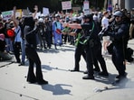 Los Angeles Metro Police and demonstrators confront each other during a protest against federal immigration sweeps in downtown Los Angeles, California, US on June 8, 2025.
