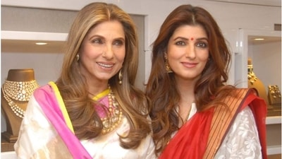 Posing with her daughter Twinkle Khanna, Dimple gives her tough competition, looking just as radiant in an elegant saree paired with golden jewellery. (Instagram) Posing with her daughter Twinkle Khanna, Dimple gives her tough competition, looking just as radiant in an elegant saree paired with golden jewellery. (Instagram)