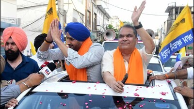 Former cricketer and Rajya Sabha MP Harbhajan Singh during the roadshow with AAP candidate Sanjeev Arora on Sunday. (HT Photo) Former cricketer and Rajya Sabha MP Harbhajan Singh during the roadshow with AAP candidate Sanjeev Arora on Sunday. (HT Photo)