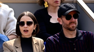 Lily Collins sat courtside in a black turtleneck layered under a beige jacket. (X/@atptour) Lily Collins sat courtside in a black turtleneck layered under a beige jacket. (X/@atptour)