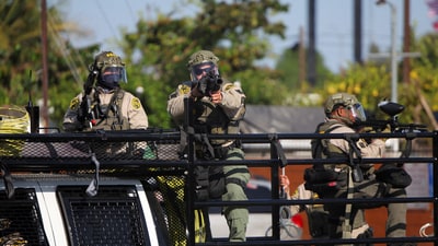 Trump federalised California’s state military to deploy troops, a rare move described by Newsom as “purposefully inflammatory.” In pic: Members of security forces operate during a standoff between police and protesters in LA. (REUTERS)