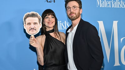 Minutes after pictures from the event hit the internet, fans thought it was hilarious what Dakota and Chris did. (Evan Agostini/Invision/AP)