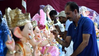 Pune, India - August 31, 2024: An artist doing last touch ups to the Ganesha idol for the upcoming Ganesh Festival at Shukrawar peth in Pune, India, on Saturday, August 31, 2024. (HT photo) Pune, India - August 31, 2024: An artist doing last touch ups to the Ganesha idol for the upcoming Ganesh Festival at Shukrawar peth in Pune, India, on Saturday, August 31, 2024. (HT photo)