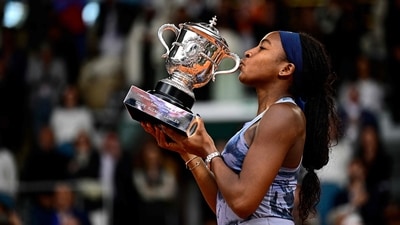 US Coco Gauff kisses the trophy after winning the French Open tennis tournament women's singles final match against Belarus' Aryna Sabalenka, on Court Philippe-Chatrier at the Roland-Garros Complex (AFP) US Coco Gauff kisses the trophy after winning the French Open tennis tournament women's singles final match against Belarus' Aryna Sabalenka, on Court Philippe-Chatrier at the Roland-Garros Complex (AFP)