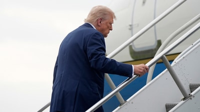 President Donald Trump boards Air Force One at Morristown Municipal Airport in Morristown, N.J., on his way to Camp David, Md., Sunday, June 8, 2025. (AP) President Donald Trump boards Air Force One at Morristown Municipal Airport in Morristown, N.J., on his way to Camp David, Md., Sunday, June 8, 2025. (AP)
