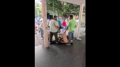 Two cars selling clothes illegally were also impounded near Kiran Cinema in Sector 22. (HT Photo)