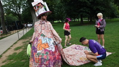 During the "International Rally + March on Washington for Freedom" in Washington, D.C., attendees came together to paint Tyler Cargill’s outfit in a vibrant, collaborative display of creativity and pride.REUTERS/Leah Millis (REUTERS)