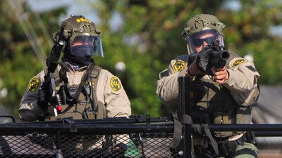 Members of law enforcement operate amidst a standoff between police and protesters following multiple detentions by Immigration and Customs Enforcement (ICE), in the Los Angeles County city of Paramount, California, U.S., June 7, 2025. (REUTERS)