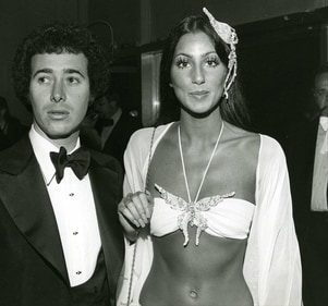 A young David Geffen with Cher.