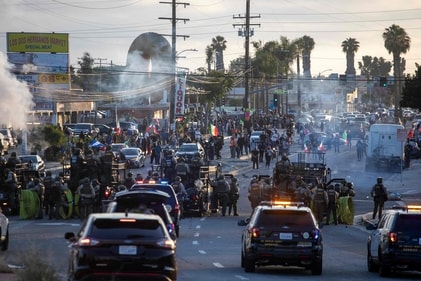 Law enforcement clashes with demonstrators during a protest following federal immigration operations in the Compton neighbourhood of Los Angeles, California, on June 7, 2025. (AFP) Law enforcement clashes with demonstrators during a protest following federal immigration operations in the Compton neighbourhood of Los Angeles, California, on June 7, 2025. (AFP)