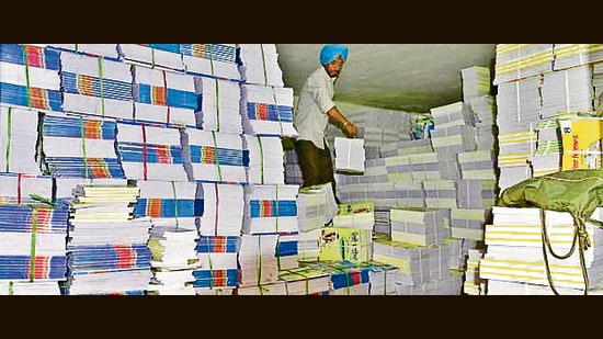 Ludhiana, India – April 13, 2018 : Workers loading PSEB Text books to the truck Sanatan Dharam School civil lines in Ludhiana on Friday, April 13, 2018. (Photo by Gurpreet Singh/Hindustan Times) (REPRESENTATIVE PIC)