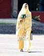 A woman takes cover from the scorching sun in Chandigarh. (Ravi Kumar/HT) A woman takes cover from the scorching sun in Chandigarh. (Ravi Kumar/HT)