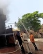 Firefighter dousing flames at the paint factory in the Anngarh area, Amritsar, on Sunday. (Sameer Sehgal/HT) Firefighter dousing flames at the paint factory in the Anngarh area, Amritsar, on Sunday. (Sameer Sehgal/HT)