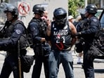 A protestor is arrested by LAPD officers on June 08, 2025 in Los Angeles, California. A protestor is arrested by LAPD officers on June 08, 2025 in Los Angeles, California.