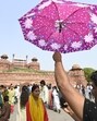 Visitors at Red Fort during hot weather in Delhi on Sunday. (Sanjeev Verma/ HT Photo) Visitors at Red Fort during hot weather in Delhi on Sunday. (Sanjeev Verma/ HT Photo)