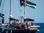 Activists of the Freedom Flotilla Coalition, board the Madleen boat, ahead of setting sail for Gaza, departing from the Sicilian port of Catania, Italy, 