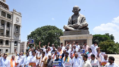 Leader of Opposition in Karnataka Legislative Assembly R Ashoka staged a protest against the state government regarding the Bengaluru stampede. ((ANI Photo)) Leader of Opposition in Karnataka Legislative Assembly R Ashoka staged a protest against the state government regarding the Bengaluru stampede. ((ANI Photo))