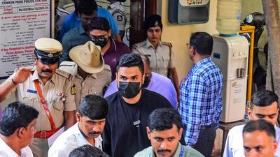 Royal Challengers Bengaluru's (RCB) Head of Marketing and Revenue, Nikhil Sosale’s (black t-shirt) legal team told the Karnataka high court that he was detained by the Central Crime Branch (CCB) at 4.30 am at the airport, bypassing the Cubbon Park police who initially filed the case (AFP) Royal Challengers Bengaluru's (RCB) Head of Marketing and Revenue, Nikhil Sosale’s (black t-shirt) legal team told the Karnataka high court that he was detained by the Central Crime Branch (CCB) at 4.30 am at the airport, bypassing the Cubbon Park police who initially filed the case (AFP)