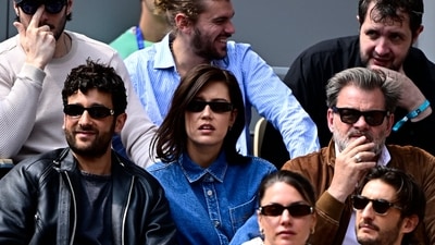 French actress Adele Exarchopoulos (C) and French actor Clovis Cornillac (R) attend the men's singles final match on day 15 of the French Open tennis tournament on Court Philippe-Chatrier at the Roland-Garros Complex in Paris on June 8, 2025. (AFP) French actress Adele Exarchopoulos (C) and French actor Clovis Cornillac (R) attend the men's singles final match on day 15 of the French Open tennis tournament on Court Philippe-Chatrier at the Roland-Garros Complex in Paris on June 8, 2025. (AFP)