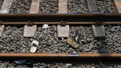 Thane, India. June 09, 2025: Footwear of victims seen on the railway track at Mumbra Railway Station. Four commuters lost their lives and nine others were injured. The incident occurred when the commuters fell from a train heading to Chhatrapati Shivaji Maharaj Terminus (CSMT) on June 9, 2025. Thane, India. 09, 2025. (Photo by Raju Shinde/HT Photo) (Hindustan Times) Thane, India. June 09, 2025: Footwear of victims seen on the railway track at Mumbra Railway Station. Four commuters lost their lives and nine others were injured. The incident occurred when the commuters fell from a train heading to Chhatrapati Shivaji Maharaj Terminus (CSMT) on June 9, 2025. Thane, India. 09, 2025. (Photo by Raju Shinde/HT Photo) (Hindustan Times)