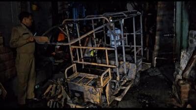 The charred vehicle after the fire. (PTI) The charred vehicle after the fire. (PTI)