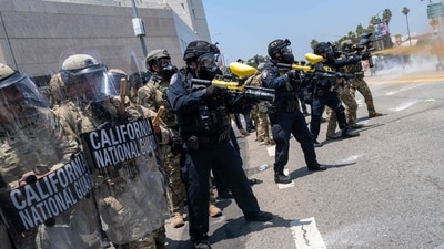 The Guards were deployed specifically to protect federal buildings, including the downtown detention center where protesters concentrated. (AFP) The Guards were deployed specifically to protect federal buildings, including the downtown detention center where protesters concentrated. (AFP)