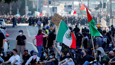 The White House rejected Governor Newsom’s claim, stating "everyone saw the chaos, violence and lawlessness." Earlier, National Guard and Homeland Security personnel pushed back demonstrators outside a federal building in downtown LA. (REUTERS)