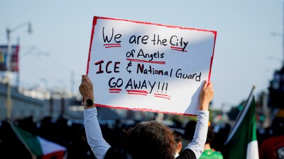 Protesters rally against federal immigration sweeps in downtown Los Angeles. Governor Gavin Newsom said he asked the Trump administration to withdraw its order deploying 2,000 National Guard troops to Los Angeles County, calling it unlawful. (REUTERS)