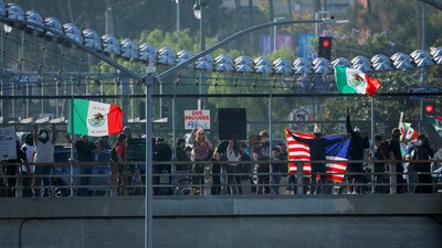Groups of protesters, many waving Mexican flags and holding signs condemning U.S. immigration authorities, gathered at various locations around the city. (REUTERS)