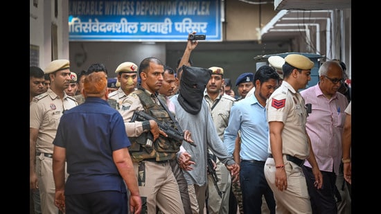 Tahawwur Rana, a 26/11 accused, extradited from the US leaves the Patiala House Court, on April 28. (Hindustan Times File/Sachit Khanna)
