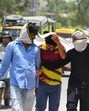 People seen covering their heads and faces to protect themselves on a hot summer day in Gurugram on Monday. (Parveen Kumar/Hindustan Times)