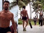 Tiger Shroff and Akshay Kumar playing cricket together.