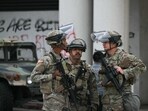 The decision to send in the National Guard and the Marines has provoked an outcry from Democrats. 