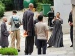 In the now-viral image, the San Antonio Spurs player is seen with a shaved head at a temple in the Henan province, as per China Daily. In the now-viral image, the San Antonio Spurs player is seen with a shaved head at a temple in the Henan province, as per China Daily.