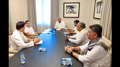 Congress president Mallikarjun Kharge, LoP in the Lok Sabha and party leader Rahul Gandhi, state party in-charge Randeep Surjewala and party leader KC Venugopal with Chief Minister Siddaramaiah and Deputy CM DK Shivakumar during a meeting to discuss the Bengaluru stampede incident which left 11 people dead, in New Delhi. (PTI) Congress president Mallikarjun Kharge, LoP in the Lok Sabha and party leader Rahul Gandhi, state party in-charge Randeep Surjewala and party leader KC Venugopal with Chief Minister Siddaramaiah and Deputy CM DK Shivakumar during a meeting to discuss the Bengaluru stampede incident which left 11 people dead, in New Delhi. (PTI)