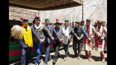 Himachal Pradesh chief minister Sukhvinder Singh Sukhu takes part in a performance during the launch of border tourism activities, at Shipki La pass, in Kinnaur on Tuesday. (PTI)