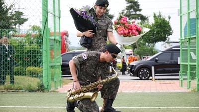 BTS members V and RM, arrive for an event after being discharged from South Korea’s mandatory military service, in Chuncheon, South Korea, June 10, 2025.&nbsp; (REUTERS)